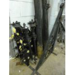 A QUANTITY OF DISMANTLED PAINTED CAST IRON BALLESTRADES, and a wall hanging bracket