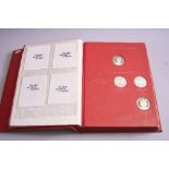 AN ALBUM OF FORTY THREE STERLING SILVER MEDALS, by the Franklin Mint 1970-1974, Forty three proof