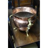 AN ARTS AND CRAFTS STYLE BEATEN COPPER AND BRASS CAULDRON, (indistinct mark to base) and a small