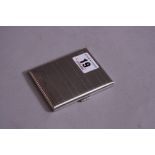 A SILVER CIGARETTE CASE, having reeded banding to body, monogrammed K A, Birmingham 1927,