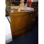 AN ERCOL TV CABINET