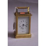 A BRASS CARRIAGE CLOCK, by Bayard, approximate height 11cm