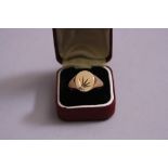 A 9CT SIGNET RING SET WITH A DIAMOND, ring size T, approximate weight 8.3 grams