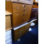 A TEAK DESK, with five various drawers and formica top, a G Plan teak chest of four long drawers and