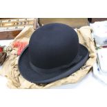 A FELT BOWLER HAT, by A Dunn & Co 429 Strand, 17'6 size 714