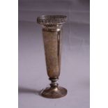 A SILVER TRUMPET VASE, having pierced diamond shaped gallery, set on circular foot, Sheffield