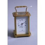 A MATTHEW NORMAN, LONDON BRASS CARRIAGE CLOCK, original case, 11cm, instructions, key