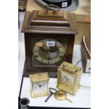 TWO QUARTZ CARRIAGE CLOCKS, together with a mantel clock (key and pendulum) (3)