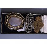 A DECO SILVER PLAQUE BROOCH, Victorian pinchbeck brooch and a Victorian silver coin brooch (3)