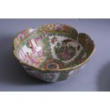 A FAMILLE ROSE ORIENTAL FOOTED BOWL, six orange character marks to base, diameter approximately