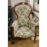 A MODERN VICTORIAN STYLE SPOON BACK ARMCHAIR, with tapestry floral upholstery