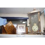 AN ART DECO STYLE WALNUT CASED MANTEL CLOCK, an oak cased mantel clock and a late 19th Century