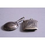 A NOVELTY SILVER MIRROR COMPACT, (Birmingham 1923) and a silver vesta (Birmingham 1903) (2)