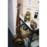 TWO COPPER AND BRASS WARMING PANS, a small brass milk can with lid and a wooden and metal pulley (