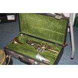 A CASED B & S SONORA BRASS AND PLATED TRUMPET, with mouthpiece and mute