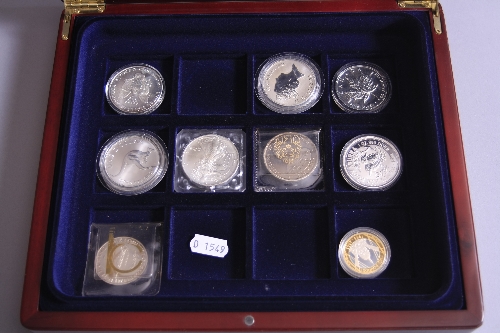 NINE VARIOUS SILVER COINS