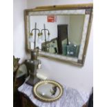 A WALL MIRROR, approximate size 92cm x 67cm, three other wall mirrors and a table lamp (no shade) (