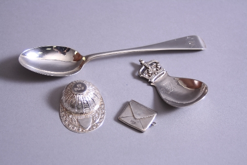 TWO ELIZABETH II SILVER CADDY SPOONS, one cast as a jockey's cap, maker HC, Sheffield 1997, the