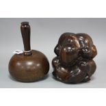 A TURNED ROSEWOOD MALLET, approximately 23cm, together with carved figural study, seated gent with