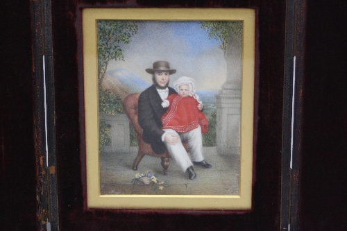 A RECTANGULAR PORTRAIT MINIATURE, depicting child on gents lap seated on nursing chair on verandah