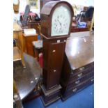 A MAHOGANY CASED GRANDMOTHER CLOCK (key and pendulum)