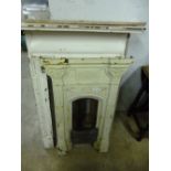 A PAINTED CAST IRON BEDROOM FIREPLACE, and a similar smaller fireplace (no shelf) (2)