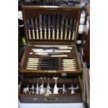 AN OAK CANTEEN OF CUTLERY, with front opening drawer (key)