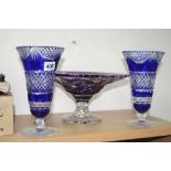 A PAIR OF BLUE FLASHED GLASS VASES, height approximately 22cm and a purple glass tazza (3)