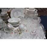 A QUANTITY OF GLASSWARES, including decanters, drinking glasses etc, and a part dinner service