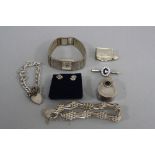 A MIXED LOT OF SILVER, including watch, bracelet, novelty charms, etc