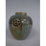 A RUSKIN POTTERY POT POURRI VASE, having five pierced roundels to upper ovoid body, having green