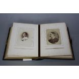A LATE VICTORIAN LEATHER BOUND PHOTOGRAPH ALBUM, containing approximately forty two portrait