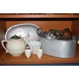 A COLLECTION OF VICTORIAN AND LATER CERAMIC AND METAL KITCHENALIA, including ceramic jelly moulds,