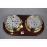 SEWILLS OF LIVERPOOL MODERN BRASS CASED SHIPS CLOCK AND BAROMETER, mounted on a mahogany plaque,