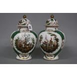 A PAIR OF 'AUGUSTUS REX' BULBOUS VASES AND COVERS, having battle scene decoration, green trellis