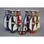 A COLLECTION OF SIX MCGIBBONS SCOTCH WHISKY, in sealed Ceramic vessels designed as a Golf bag, all
