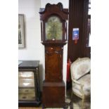 A GEORGIAN MAHOGANY LONGCASE CLOCK, eight day movement, arched brass face with cast spandrels,