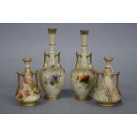 TWO PAIRS OF ROYAL WORCESTER BLUSH IVORY GROUND TWIN HANDLED VASES, one pair of conical form,