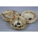 THREE EARLY 20TH CENTURY ALABSTER CEILING LIGHT SHADES, of circular form, with chains and fixing,