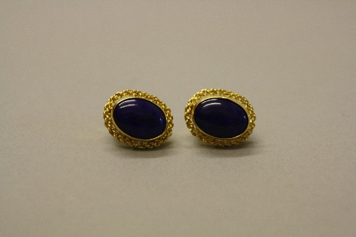 A MODERN PAIR OF LAPIS LAZULI CLIP EAR STUDS, oval cabochon cut lapis lazuli stones measuring