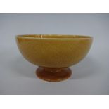 A RUSKIN POTTERY FOOTED BOWL, having feathered brown glaze, impressed Ruskin, England to base of