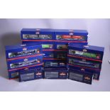 A QUANTITY OF BOXED BACHMANN OO GAUGE INTERMODAL BOGIE CONTAINER WAGONS, containers in assorted