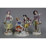 A PAIR OF SITZENDORF PORCELAIN FIGURES, of a shepherdess and musician, both with bottles, in 18th