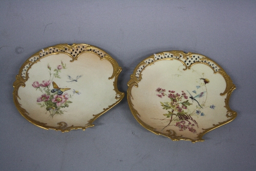 A PAIR OF ROYAL WORCESTER BLUSH IVORY DESSERT PLATES, of reticulated and asymmetric design,