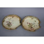 A PAIR OF ROYAL WORCESTER BLUSH IVORY DESSERT PLATES, of reticulated and asymmetric design,