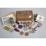 A WOODEN BOX CONTAINING AN IMPRESSIVE GROUP OF WWII MEDALS, to a Polish Soldier who saw action at