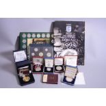 A SMALL COLLECTION OF BOXED COINAGE, to include silver proofs, Crowns Year set 1995, Britannia