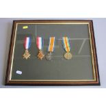 A GLAZED FRAME CONTAINING A COPY 1914 WWI STAR, (un-named) together with a 1914-15 Star, British War
