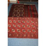 THREE 20TH CENTURY RED GROUND PERSIAN DESIGN RUGS, with multi strap borders and geometric designs,