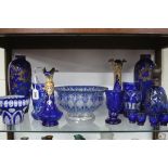 A GROUP OF 19TH CENTURY AND 20TH CENTURY BLUE GLASSWARE, including Bohemian cut to clear vases,